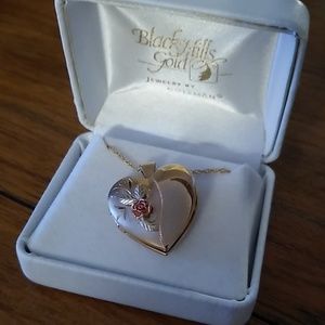 Gold heart shaped locket